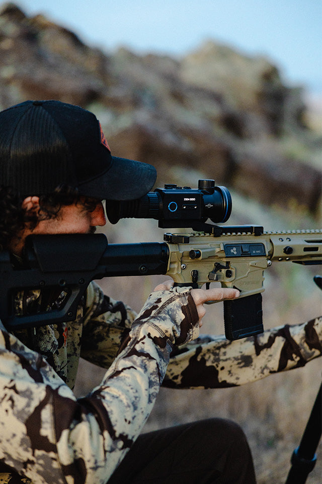 Zentron ZEN Q50 thermal scope in an outdoor field setting